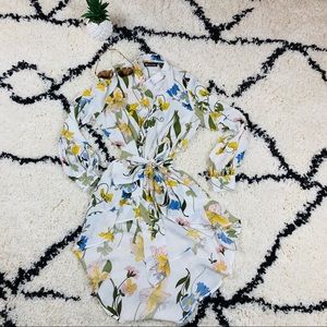 Spring floral tie sting dress on front